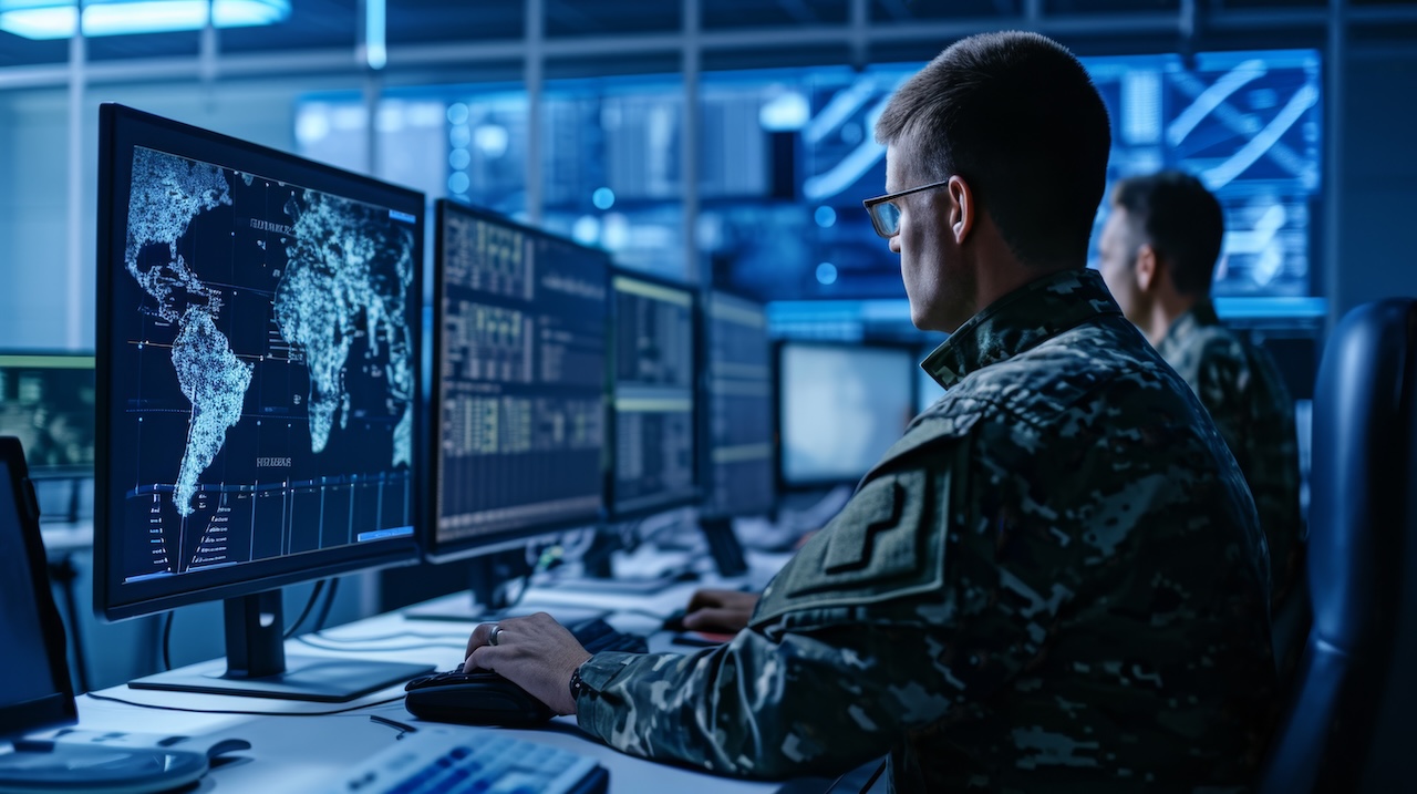 military personnel is focused on monitoring multiple computer screens in a high-tech surveillance room with global maps and data on the screens