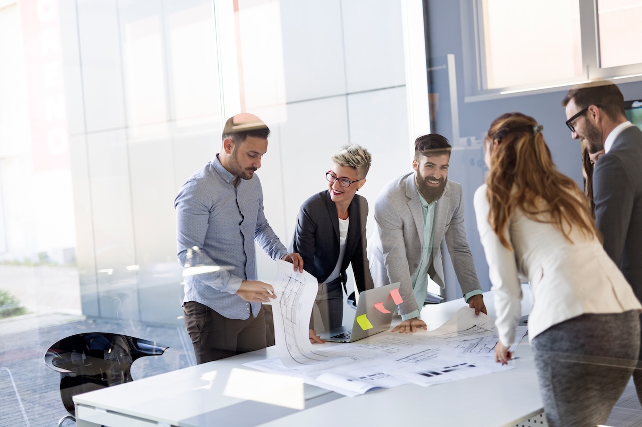 Group of architects and business people working together