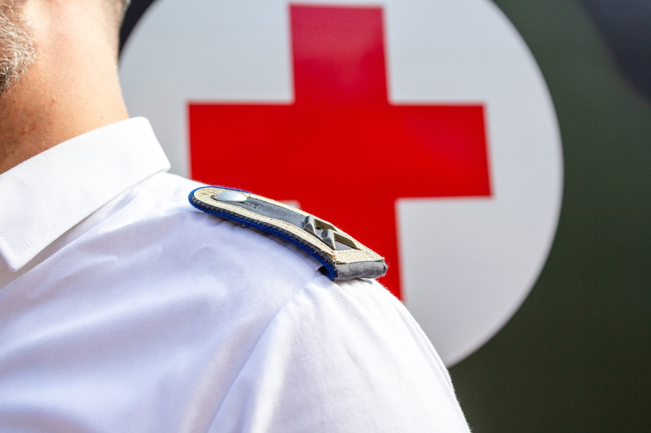 PEINE / GERMANY - JUNE 22, 2019: German paramedic soldier stands at public event, day of uniform in Peine.